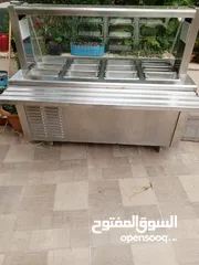  2 ثلاجة سلطات تبريد هواء بحالة جيدة وبلاطة جريل ايطالية بحالة جيدة
