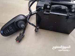  2 يد تحكم  + البطاريه لكرسي متحرك كهربائي