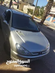  3 سيارة بيجو 206 فضي
