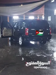  7 شيفرولية تاهو 2009 اسود هايبرد