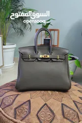  1 HERMÈS BIRKIN 25 BAG TOGO LEATHER GOLDEN PLATED HARDWARE