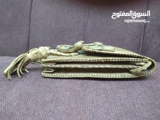  8 نوادر..حقيبة من جلد صغير تنين الكومودو