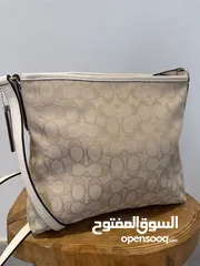  3 Coach signature canvas cross body bag