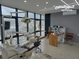  2 زراعة وتجميل الاسنان في جنين مركز د. اسامة عواد -برج الساعة ط4