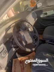  12 كيا تشوما موديل 1999