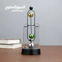  1 منظر بندول  ديكور نابض متحرك دوران عكسي  بالتنافر المغناطيسي  ل مكتب او منزل