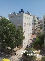  7 شقه للبيع عمارة اربع طوابق مصعد عمر البناء18سنه مفرق شارع المحكمه وللارسال