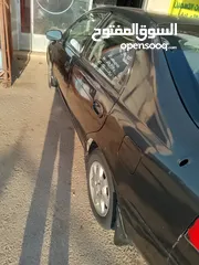  1 كيا تشوما موديل 1999