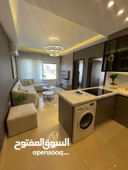  12 شقه استثمارية  للبيع او للايجار مفروش في الخامس - ref : 14676