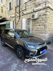  1 متسوبيشي اوتلاندر 2016  يداولى.    4x4 بنزين ماطور 2000.       7ركاب    فحص ممتا