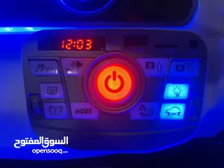  8 ‏ سيارة أطفال كهربائية مضاءة بالكامل وسماعات Children's electric car with lights and sound