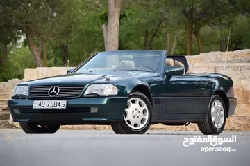  27 Mercedes SL320 1995 بحالة الوكالة