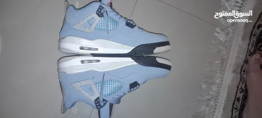  4 jordan 4 blue university