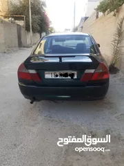  1 ميتسوبيشي لانسر  1999 ماتور 1500 دبل كم شفت انجكشن  دقات أو قصعة أمامي وخلفي غير مشغول خالي قص قلبان