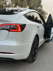  12 تسلا موديل 3 لون أبيض لؤلؤي 2022 Tesla model 3 . 2022