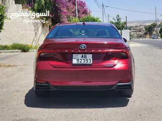  28 تويوتا افالون لون خمري حره جديد باسم المستورد 2021 فحص 3 جيد أعلى صنف بالاضافات بطاريه ليثيوم بسعر