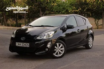  5 تيوتا  بريوس وارد المركزية  2015 Toyota Prius C