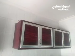  1 خزانة مطبخ واحدة المنيوم اربع ابواب