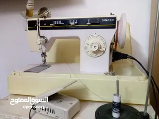  1 ماكينة خياطة سنجر قابل للتفاوض