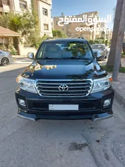  1 تويوتا لاندكروزر 2015 لون اسود V8 مالك اول  فحص كامل (  33,500 قابل للتفاوض  )