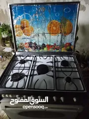  1 بوتغاز يونيرفسال ابيض شغاله فوق تحت وبسعر حرق.....