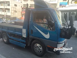  1 قلاب متسوبيشي كانتر مترين اصلي للبدل على قلاب عريض 2007