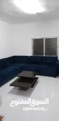  1 طقم كورنر تفصيل لون كحلي مع طاوله وسط التلفون بالوصف