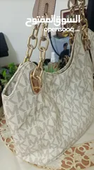 12 حقائب ستاتي ، GUCCI, Guess, BERBERRY , Louis Vuitton, Michael kors , مستعمل بحالة الوكالة مع الكود