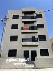 1 عمارة للبيع أربع شقق طابقية مساحة الشقة 148 متر في ماركا الشمالية قرية خالد بن الوليد