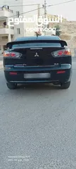  18 متسوبيشي لانسر فراشة موديل 2015 فحص مرفق مع الصور بحالة الوكاااااالة  ماشية 49 الف km  أصلي