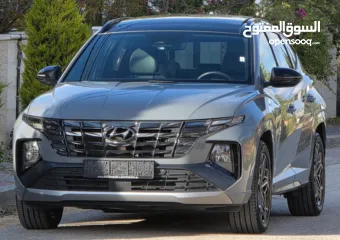  1 هنداي توسان ان لاين فتحه بنورما . هايبرد بلج ان 4×4.