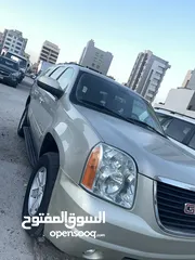  2 يوكن موديل 2014 ذهبي بحاله نظيفه جدآ