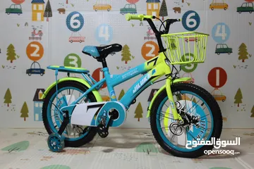  1 دراجة أطفال باللون الازرق والفسفوري مع اضافات ولا أروع من هيك – من Island Toys اسم يعني الثقة