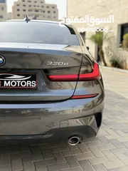  15 ترخيص 2022 BMW  330e  محرك 2000 هايبرد plug in/يقطع على الشحنه 50 كيلو متر  297 حصان