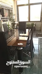  1 طاوله سفره 6كراسي سوكاريت  مركب عليها عجال