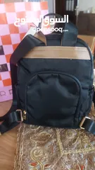  4 شنتة جديدة ضد الماء backpack ماركة PARFOIS مع جزدان لون ابيض حجم وسط