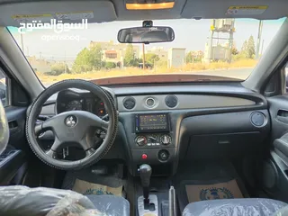  28 ميتسوبيشي آوتلاندر اوتوماتيك 2003 توب نظافة بسعرررر مميززز محرك 2400cc