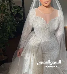  1 فستان زفاف جديد ومميزه جدا