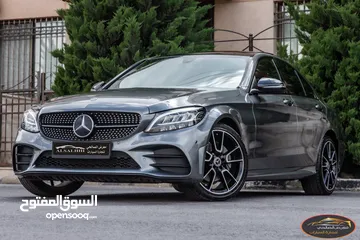  1 Mercedes C200 2019 Mild hybrid Amg kit Night Package   السيارة وارد الشركة و قطعت مسافة 83,000 كم