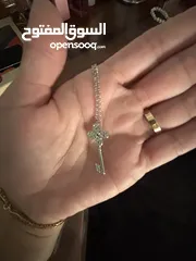  4 Swarovski key necklace - worn once. In very good condition.
