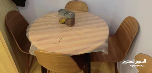  1 Round table with 4 chairs