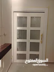  12 ابواب خشبيه داخليه و خارجيه بتصاميم حديثه وفاخره وعصريه جميع الانواع دهان  او تلبيس pvc  وقشره بلوط