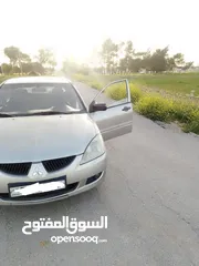  2 ميتسوبيشي لانسر موديل 2005 قير عادي للبيع