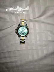  8 ساعه شبيهه برولكس بمواصفات عاليه لون اخضر