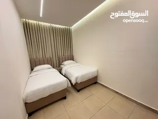  11 الدويك للاجنحة الفندقية