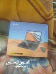  4 تابلت موديو 512 جيجا جديد استعمال شهر فقط يعمل بشكل ممتاز