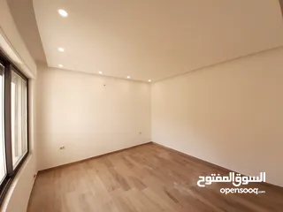  2 اخر شقة غرفتين نوم في مشروع ربوة عبدون ط ارضي مع كراج خاص و ترس كبير بأقل سعر