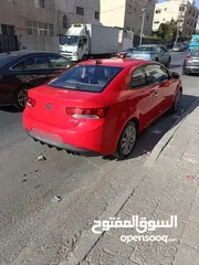  3 كيا فورتي 2011 فحص 2 جيد امامي كراسي مدفية،كوندشن،تحكم طارة،مري كهرباء كاميرا خلفية وشاشة نظام خرائط