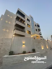  22 للبيع بالأقساط 36 شهر شقه ارضية 295م قرب جامعة البتراء طريق المطار البنيات 145م + 150م ترس
