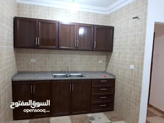  11 شقة أرضية قرب جامعة اليرموك